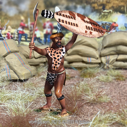 Toy soldier Senior Zulu Warrior with Axe. He is on the battlefield.