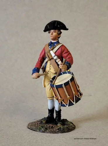 Continental Line Drummer. A painted figurine of a Revolutionary War-era drummer in a tricorn hat, red and blue uniform, beige pants, and black boots, standing and holding drumsticks above a large drum strapped to his body.