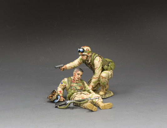 Stay Down. Two military figurines in a dynamic pose on a gray background