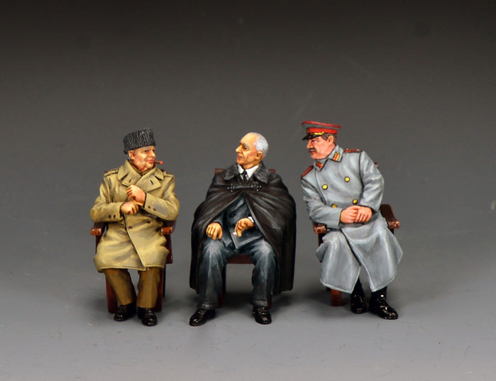 King & Country DD396 set of the Big Three seated at Yalta — Winston Churchill in greatcoat and fur hat with a cigar, an ailing Franklin Roosevelt in a cape, and Joseph Stalin in Soviet uniform.