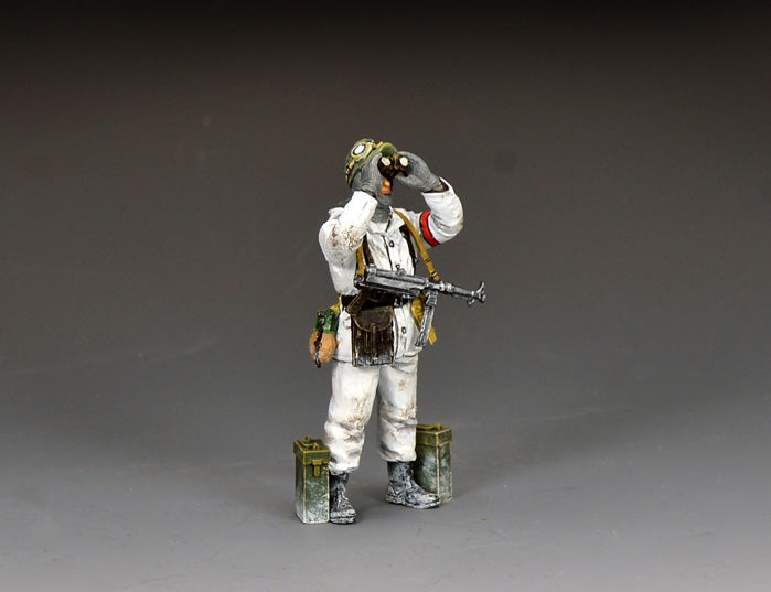 King & Country BBG139 figure of a German sergeant in a white snow suit raising binoculars to scan the sky, an MP40 slung across his chest and ammunition cans at his feet.