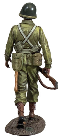 Rear view of Collectible toy soldier miniature army men U.S. Infantryman Walking figurine.