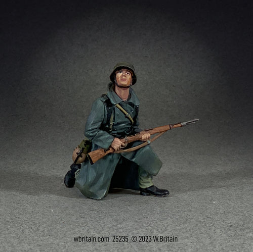 Collectible toy soldier miniature army men German Grenadier in Greatcoat Kneeling Looking Up.