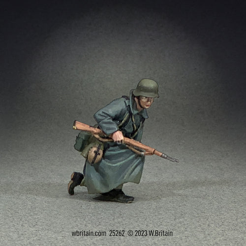 Collectible toy soldier miniature army men German Grenadier in Greatcoat Kneeling.