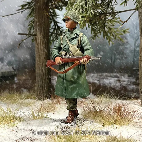 Toy Soldier figurine walking in the woods.