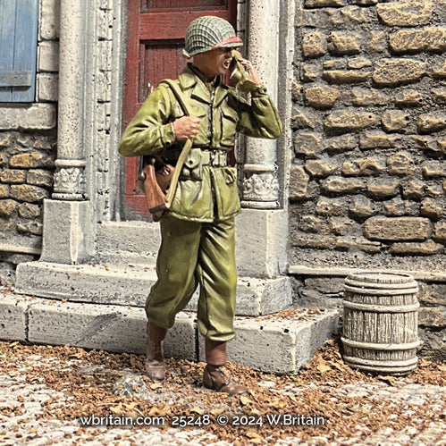 Collectible toy soldier miniature army men U.S. infantryman Walking with SCR-536 figurine. Soldier is neat stone building.