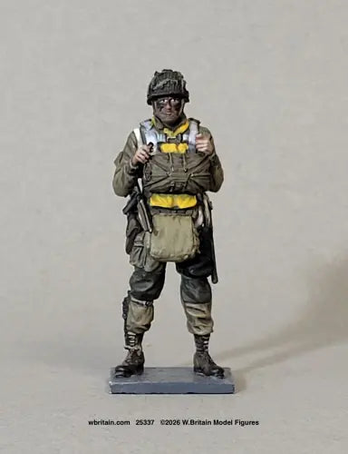 W. Britain 25337 figure of Sgt. John W. "Johnny" Martin of the 101st Airborne in D-Day jump kit — netted helmet, reserve chute, yellow life vest and leg bag, giving a thumbs-up.