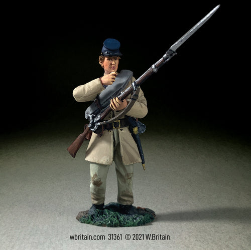 Toy soldier Confederate Infantry in Frock Coat Advancing Loading.