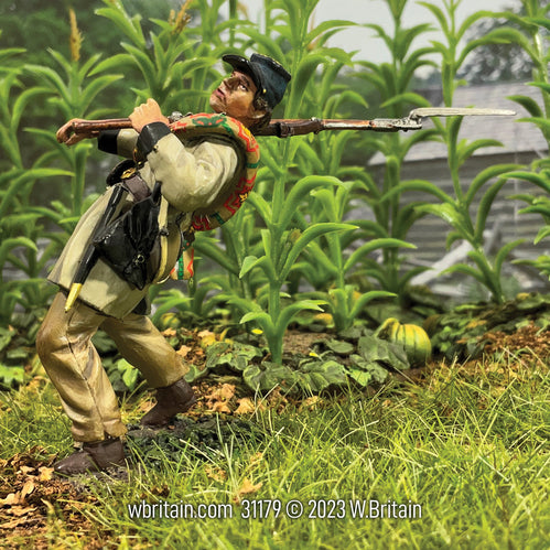 Collectible toy soldier miniature army men Texas Brigade Falling Back Wounded. In a field.