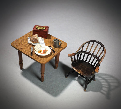 Collectible toy soldier set Coffee, News, and a Loyal Friend. Table a chair and food on the table.