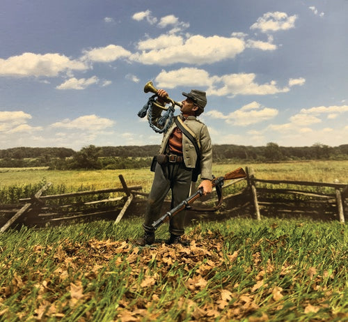Toy Soldier army men Confederate Infantry Bugler No.1. He is in a field.