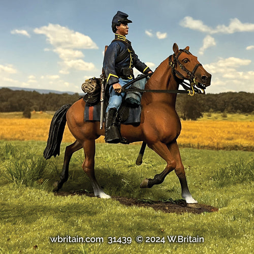 Collectible toy soldier miniature army men Union Cavalry Trooper figurine. Soldier riding a horse.