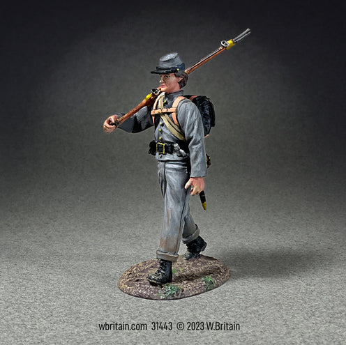 Toy soldier Confederate Infantry Marching with Knapsack Wearing Depot Jacket.