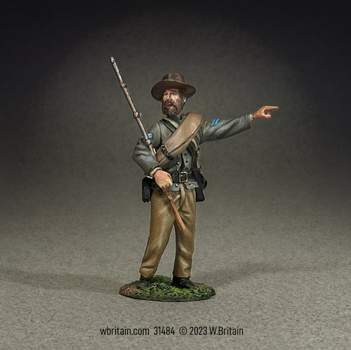 A highly detailed miniature figurine of a Confederate Infantry Corporal from the Civil War, depicted in a dynamic pose urging his men forward.