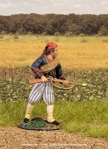 W. Britain Louisiana Tiger advancing with bayonet — Confederate Zouave in red fez, blue jacket, striped trousers. 1/30 scale matte-painted, 1861-62. Catalog 31506. Military Miniature