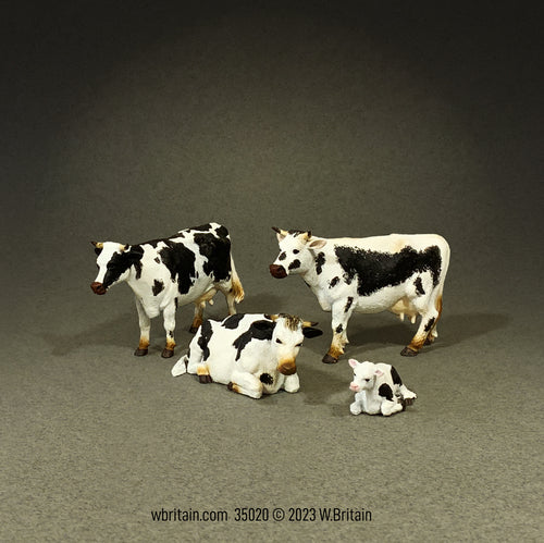 Collectible farm animal miniatures. 4 cows.