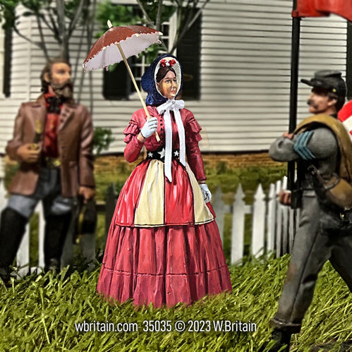 Collectible civilian miniature Miss Patty Dunbar. She is outdoors.
