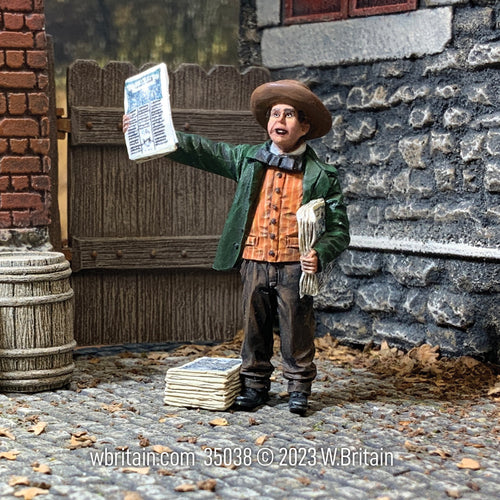 Collectible civilian miniature Read All About It! Mid 19th Century Newspaper Boy. Seen on the street selling.