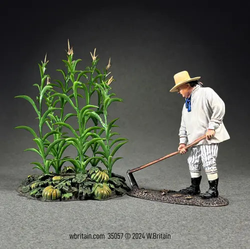 Civilian miniature figurine Farmer tending the crops.