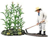 Civilian miniature figurine Farmer tending the crops. Two pieces.