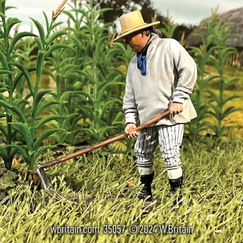 Civilian miniature figurine Farmer tending the crops. During harvest.