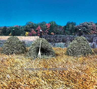 Hay Stacks with Pitch Fork