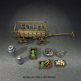 A detailed miniature set depicting a traditional wooden market cart from the mid 19th to 20th century, surrounded by various market goods. The set includes a rustic cart and eight pieces of accessories such as milk and cream cans, and crates filled with fresh vegetables, fruits, and bread. 