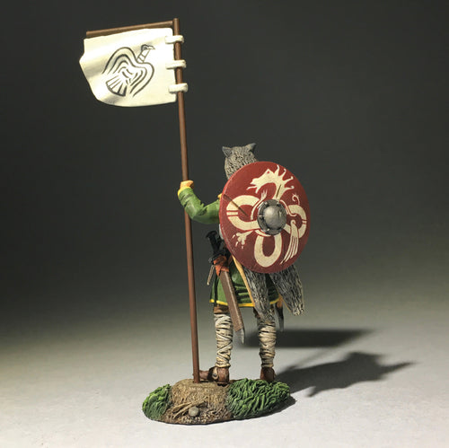 Collectible toy soldier miniature Arnlaug Viking with Raven Banner. Soldier has a red and white shield.
