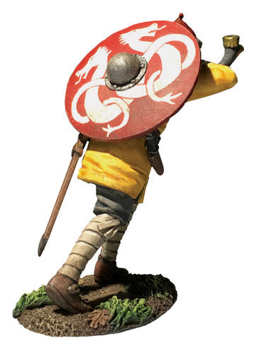 Collectible toy soldier miniature Arnljot Viking Advancing Blowing Horn. He has a large red and white shield.
