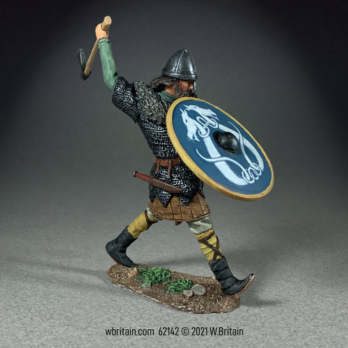 Collectible toy soldier "Fritjof" Viking Attacking with Axe. Soldier has a large blue shield.