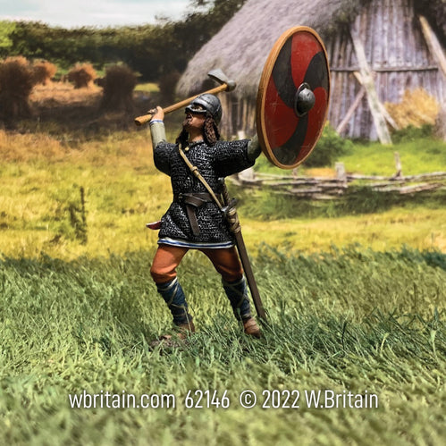 Collectible toy soldier miniature Vali Viking War Cry. He is in a field and has a red and black shield.