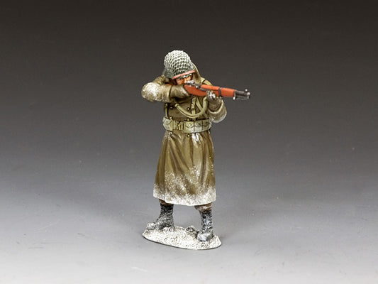 King & Country BBA095 Standing Rifleman firing M1 Garand in winter coat amid snowy Battle of the Bulge setting, 1/30 scale matte toy soldier.