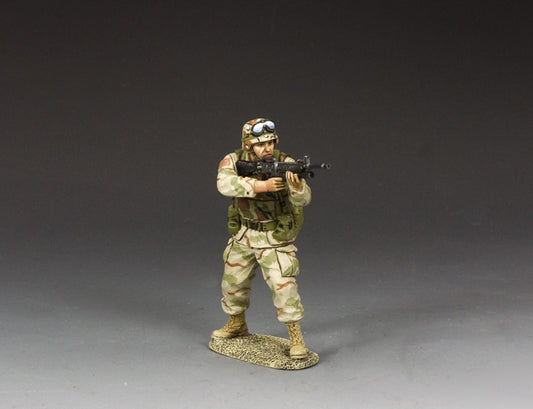 Toy Soldier U.S. Army Ranger aiming M16A2 with M203 grenade launcher in desert camo, mid-action.