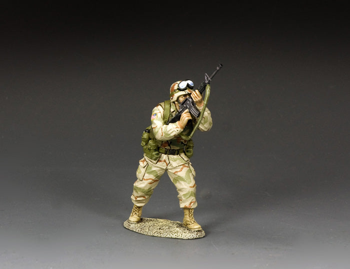 U.S. Army Ranger toy soldier aiming M16A2 upwards, engaging rooftop enemies.