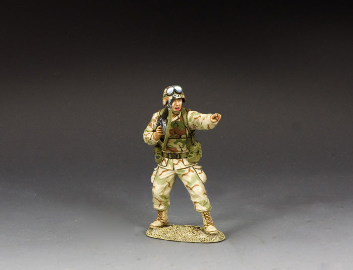 Desert-uniformed Ranger NCO toy soldier points and shouts commands while holding M16A2.