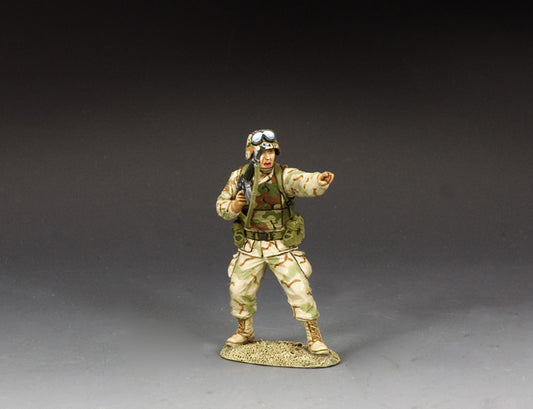 Desert-uniformed Ranger NCO toy soldier points and shouts commands while holding M16A2.