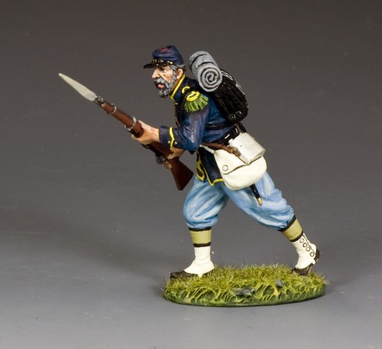 Toy Soldier Union infantryman charges with bayonet fixed, uniformed in blue with full gear and vivid detailing, mid-battle assault pose.