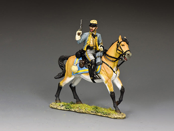 Toy soldier of a Confederate cavalry officer on horseback, wearing a yellow kepi and gray uniform, holding a revolver mid-charge.