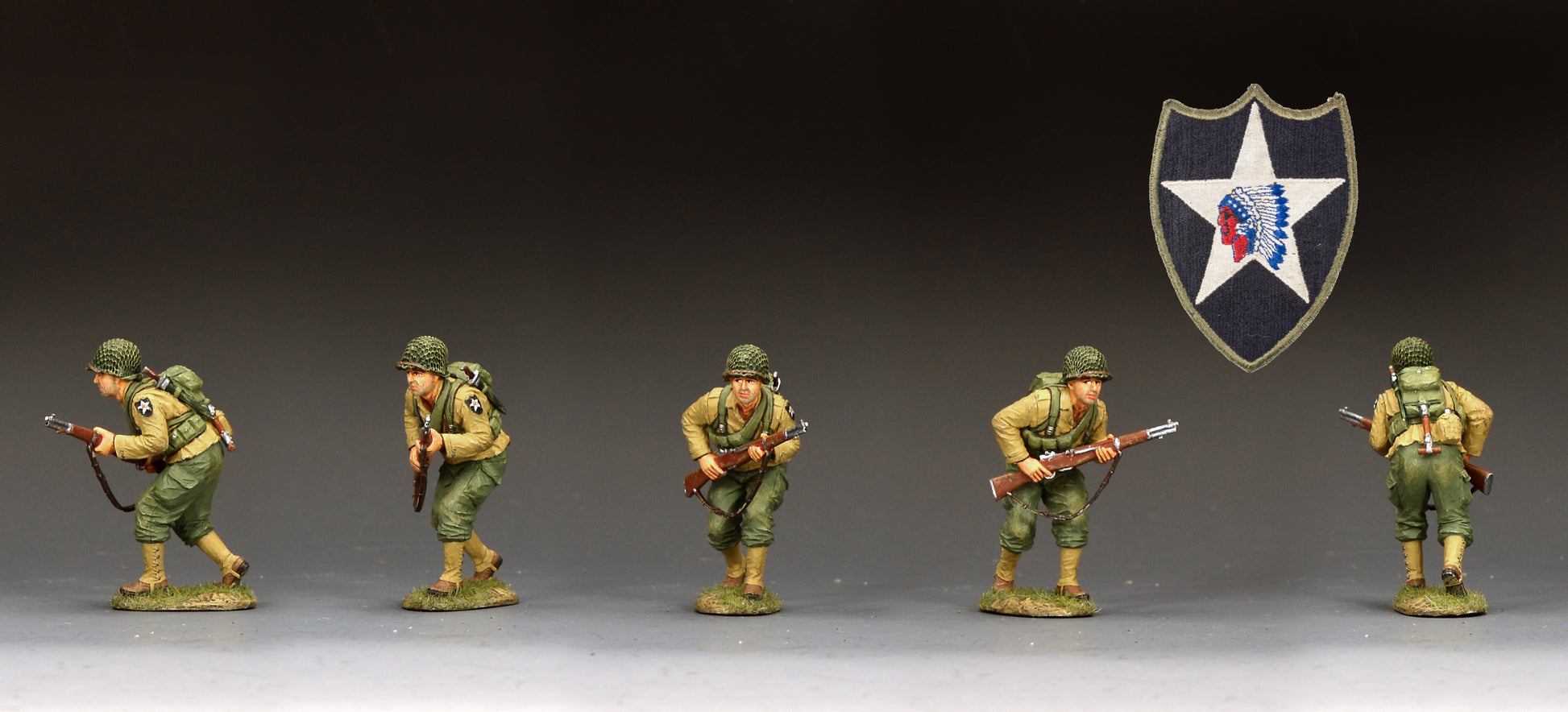 Five painted military miniature figures in olive green uniforms posed in a row on a dark gradient background, with a shield emblem featuring a white star and red/blue details above them.