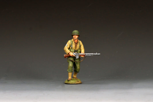 King & Country DD402 figure of a U.S. Army BAR gunner walking with a Browning Automatic Rifle held across his body, magazine belt at his waist and net-covered helmet.