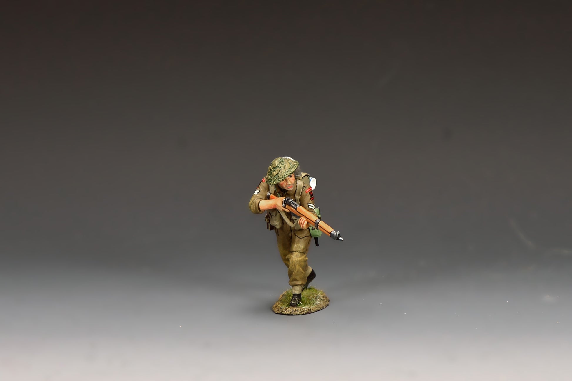 King & Country Gold Beach Advancing Rifleman, Green Howards corporal moving forward with No. 4 Mk. 1 Lee-Enfield ready for a snap shot, MkII helmet with scrim, D-Day Normandy 1944, 1/30 60mm matte figure, DD411
