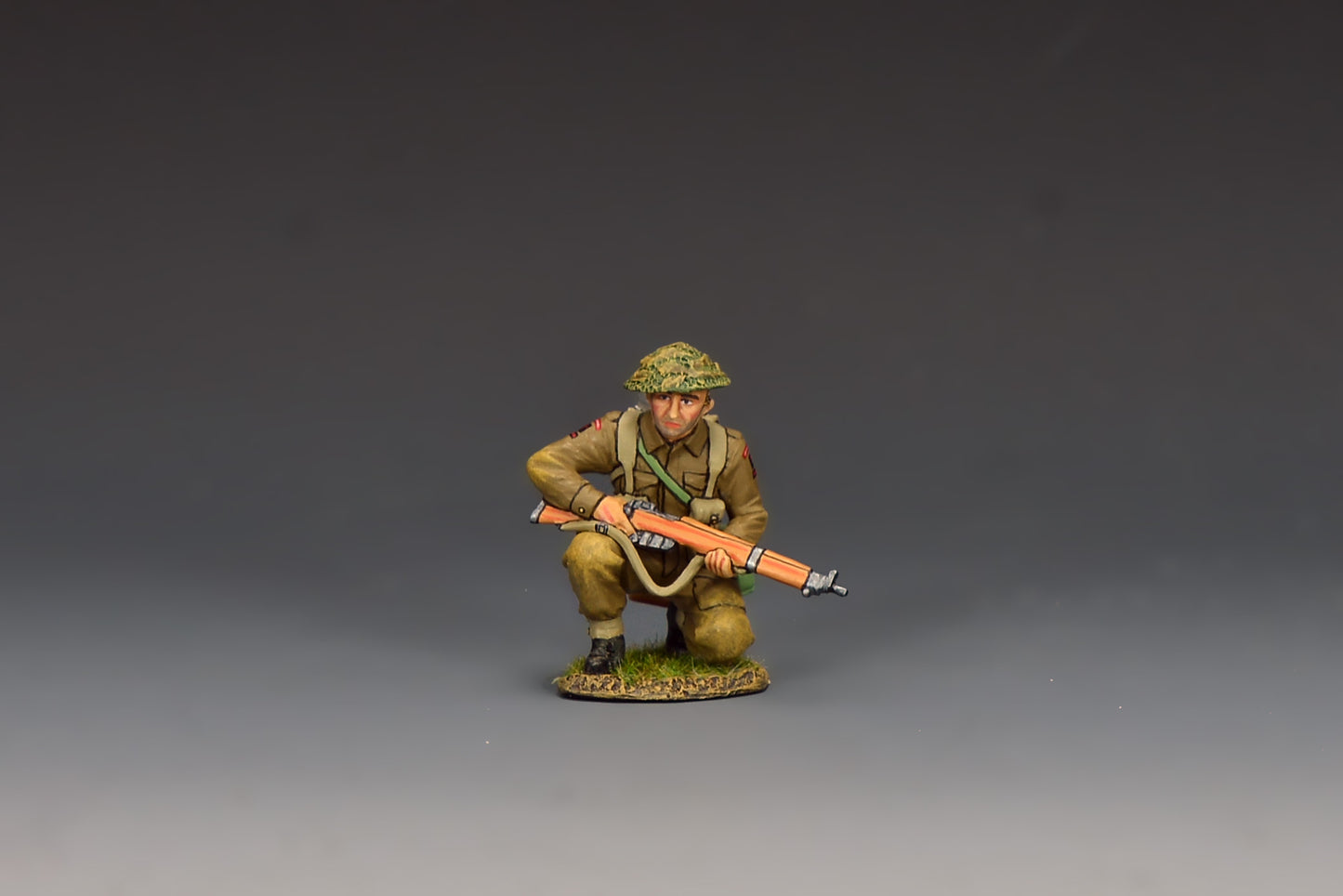 King & Country Gold Beach Kneeling Ready Rifleman, Green Howards infantryman kneeling in cover with No. 4 Mk. 1 Lee-Enfield, MkII helmet with scrim, D-Day Normandy 1944, 1/30 60mm matte figure, DD413