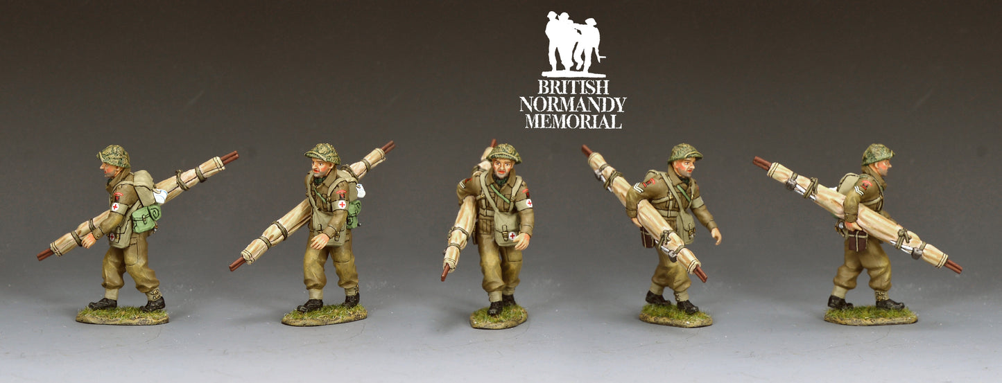 King & Country Gold Beach Medic with Stretcher, RAMC corporal in MkII helmet with scrim and Red Cross brassard, folded stretcher over shoulder, D-Day Normandy 1944, 1/30 60mm matte figure, DD416 military miniature toy soldier