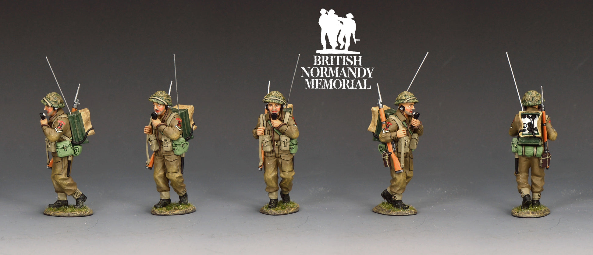 Panoramic view of toy soldier King & Country Gold Beach Radioman, Green Howards signaller with Wireless Set No. 18 and Lee-Enfield rifle, MkII helmet with scrim, D-Day Normandy 1944, 1/30 60mm matte figure, DD417