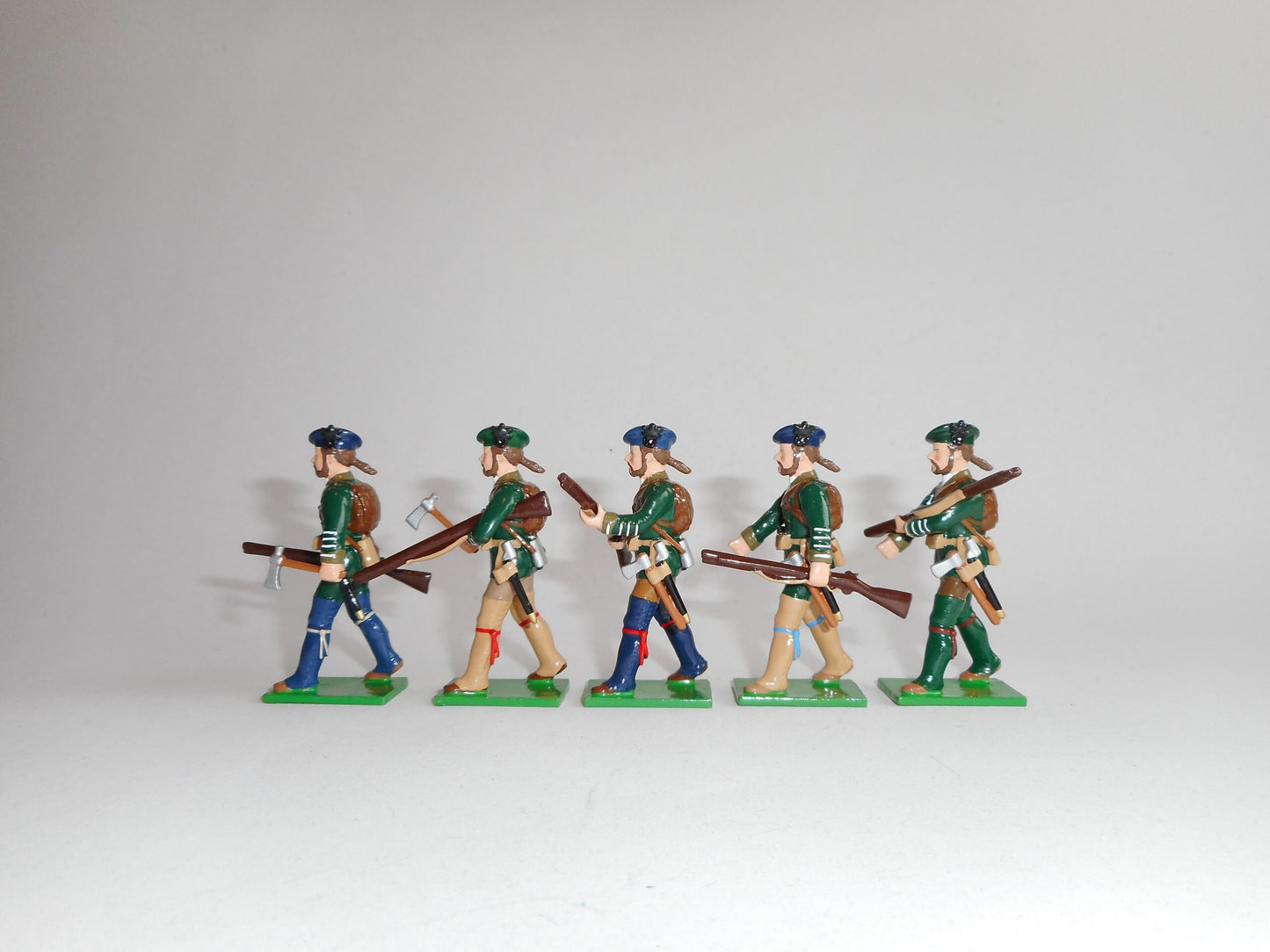 Side view of Collectible toy soldier miniature army men Rogers' Rangers figurines.