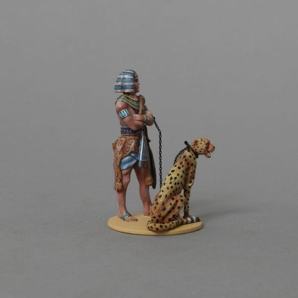 Collectible toy soldier miniature army men figurine Guard with Cheetah. Guard standing with arms folded.