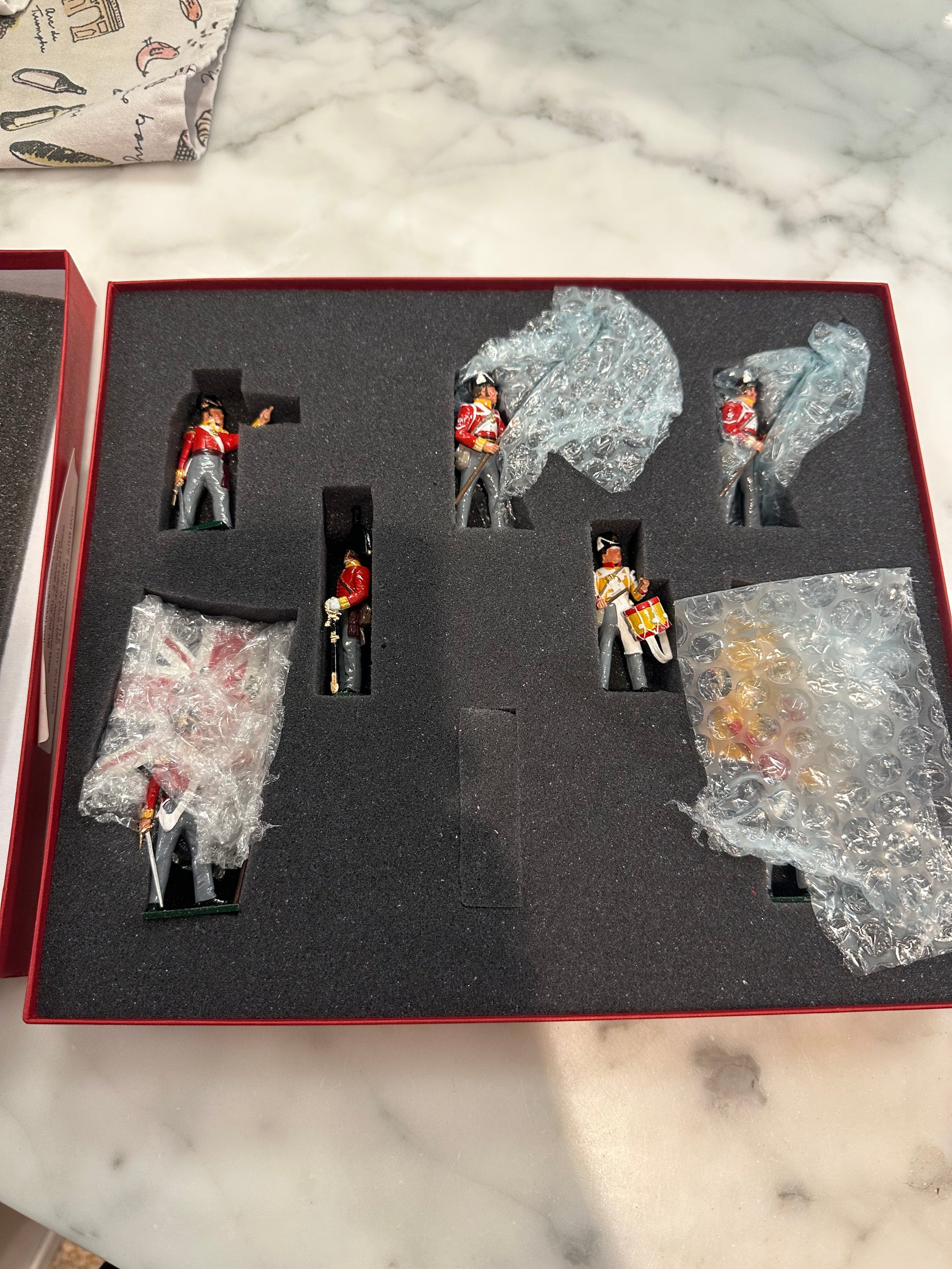 Toy soldier set packed in classical tradition red box.