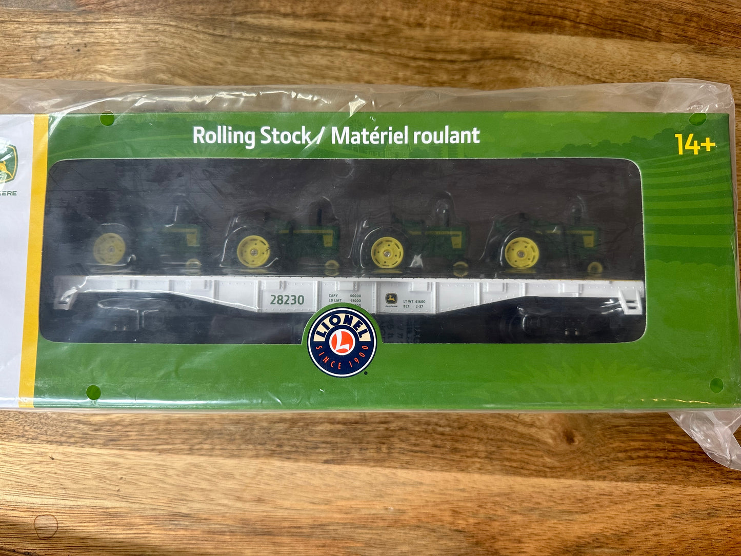 Packaging for Lionel model train rail car O scale John Deere Flatcar with Tractor Load.