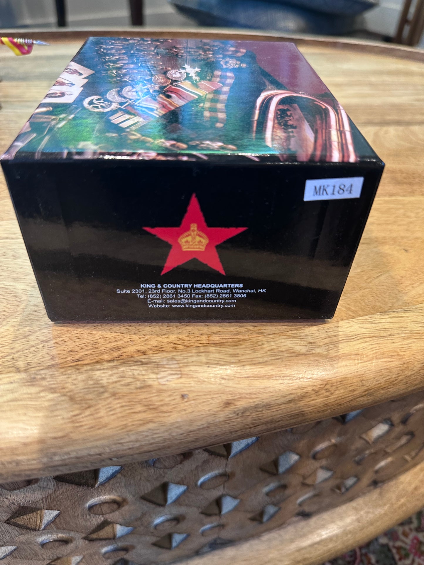 Toy Soldier Sir William Wallace packaging Black box with a red star logo on a wooden surface
