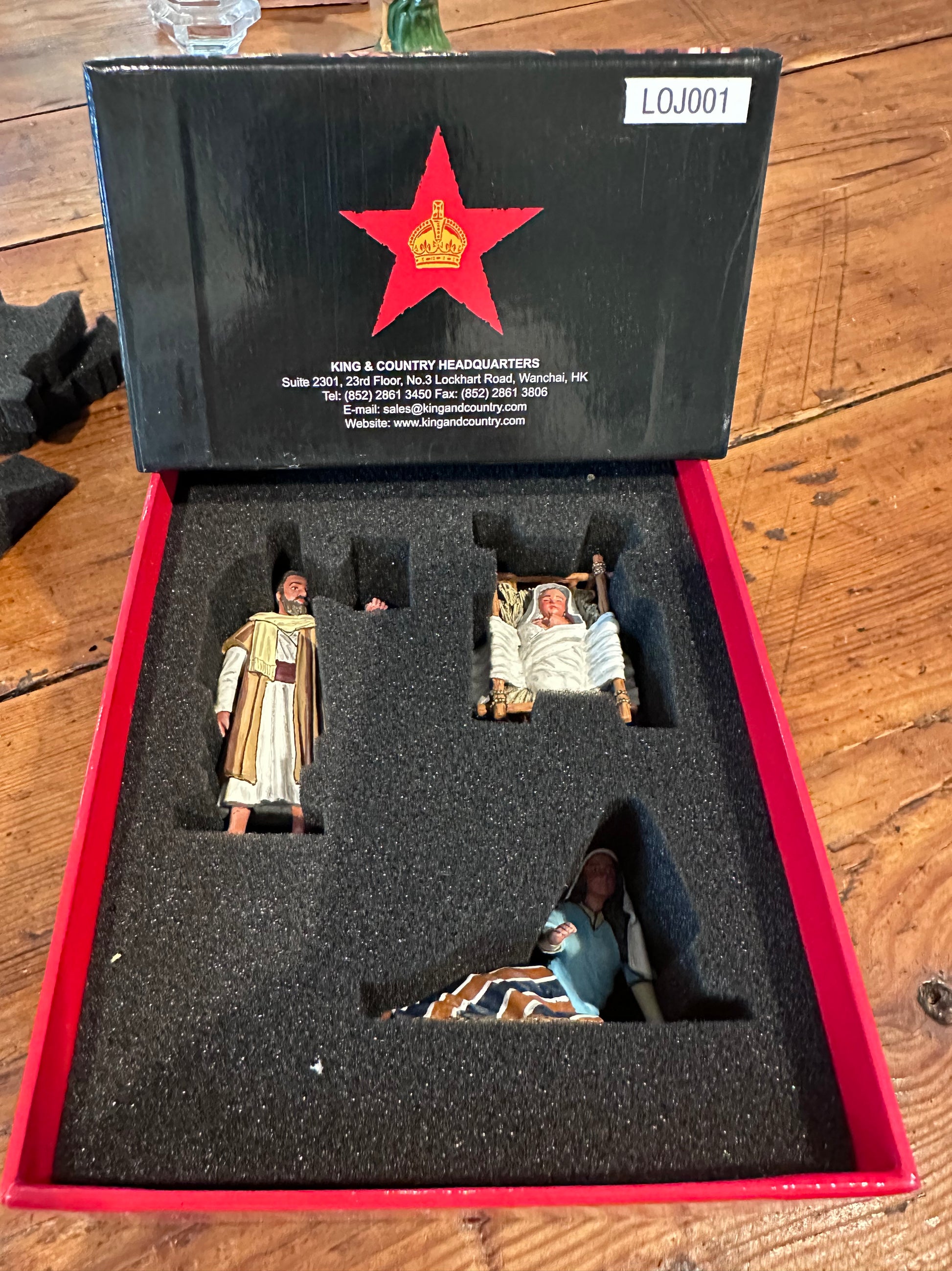 The Holy Family in the packaging box.